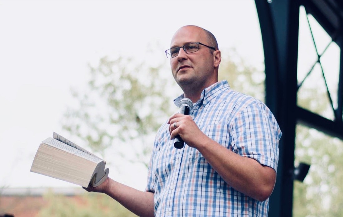 Pat Ward preaching outdoors